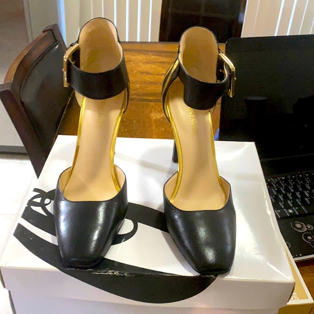 Black with gold trimming heels
